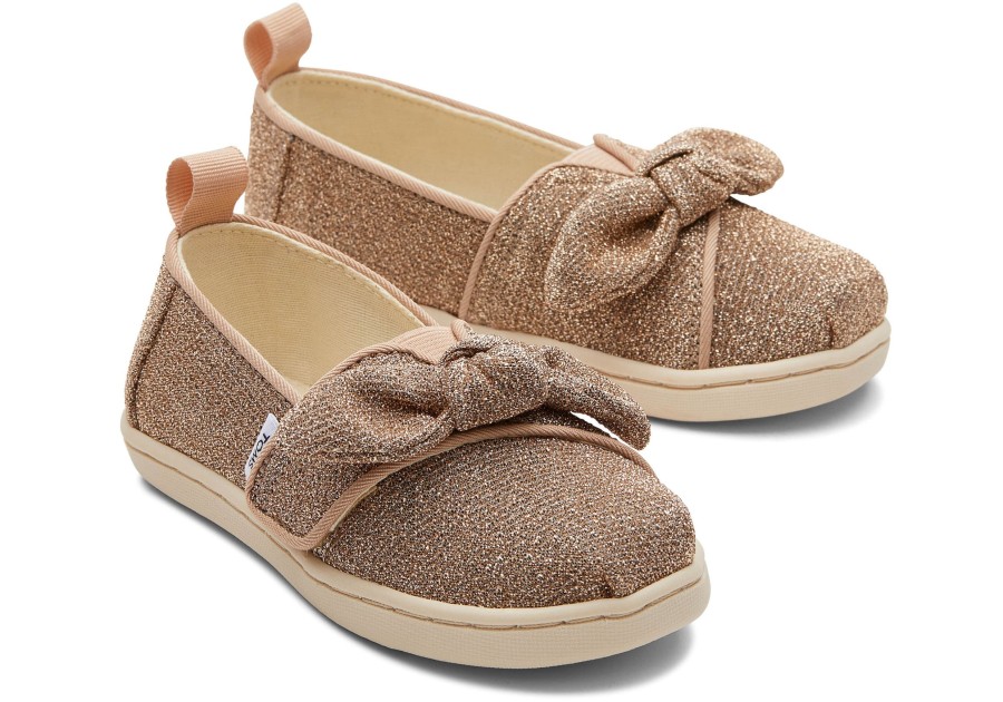 TOMS | Tiny Alpargata Bow Toddler Shoe Gold Sparkle